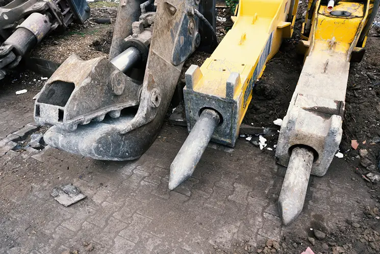 Chisels and shears as excavator attachments